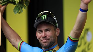 epa11455223 British rider Mark Cavendish of Astana Qazaqstan Team celebrates on the podium after winning the fifth stage of the 2024 Tour de France cycling race over 177km from Saint-Jean-de-Maurienne to Saint Vulbas, France, 03 July 2024.  EPA/GUILLAUME HORCAJUELO