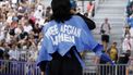 Refugee Olympic team's Manizha Talash, known as Manizha wears a jacket reading 