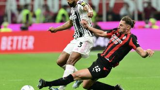 Juventus' Brazilian defender #03 Bremer (L) fights for the ball with AC Milan's French midfielder #12 Adrien Rabiot during the Italian Serie A football match between AC Milan and Juventus FC at the San Siro stadium in Milan, northern Italy, on April 26, 2026. 
Stefano RELLANDINI / AFP