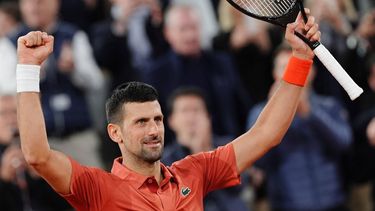 Serbia's Novak Djokovic celebrates after winning against Spain's Roberto Carballes Baena at the end of their men's singles match on Court Philippe-Chatrier on day five of the French Open tennis tournament at the Roland Garros Complex in Paris on May 30, 2024. 
Dimitar DILKOFF / AFP