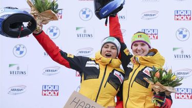 epa11194334 Lisa Buckwitz (R) and Vanessa Mark (L) of Germany react after the fourth run and winning the gold medal in the two-woman bobsleigh competition at the IBSF Bob and Skeleton World Championships in Winterberg, Germany, 02 March 2024.  EPA/CHRISTOPHER NEUNDORF