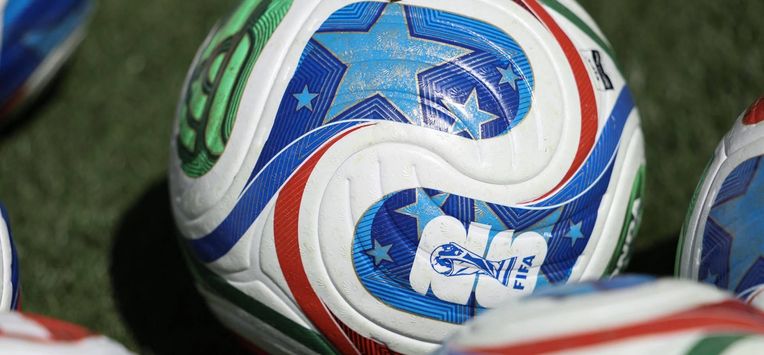 A ball with the FIFA World Cup 2026 logo sits on the field before the start of a friendly football match between Colombia and France at Northwest Stadium in Landover, Maryland, on March 29, 2026. 
FRANCK FIFE / AFP