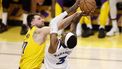 epa12047991 Los Angeles Lakers guard Luka Doncic (L) reaches out to block Minnesota Timberwolves forward Jaden McDaniels (R) with the ball during the second quarter of the first round playoff game between the Minnesota Timberwolves and Los Angeles Lakers in Los Angeles, California, USA, 22 April 2025.  EPA/CAROLINE BREHMAN SHUTTERSTOCK OUT