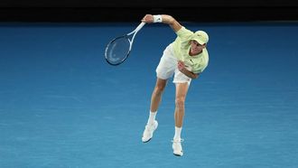 Italy's Jannik Sinner serves against Australia’s Tristan Schoolkate during their men's singles match on day five of the Australian Open tennis tournament in Melbourne on January 16, 2025. 
Martin KEEP / AFP