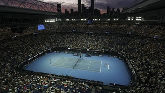 epa11091447 Linda Noskova (C-R) of the Czech Republic in action during the Women's 3rd round match against Iga Swiatek (C-L) of Poland during a sunset at the Australian Open tennis tournament in Melbourne, Australia, 20 January 2024.  EPA/MAST IRHAM