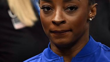 US' Simone Biles reacts after competing in the artistic gymnastics women's balance beam final during the Paris 2024 Olympic Games at the Bercy Arena in Paris, on August 5, 2024. 
Paul ELLIS / AFP