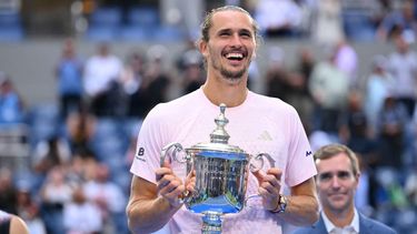 Germany's Alexander Zverev holds the trophy after defeating USA's Ben Shelton in the men's singles final tennis match on day fifteen of the US Open tennis tournament at the USTA Billie Jean King National Tennis Center in New York on September 13, 2026. 
ANGELA WEISS / AFP