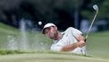 epa11578372 Scottie Scheffler of the US hits from a green side bunker on the first hole during the final round of the 2024 Tour Championship golf tournament at the East Lake Golf Club in Atlanta, Georgia, USA, 01 September 2024.  EPA/ERIK S. LESSER