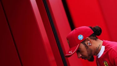 epa12281059 Scuderia Ferrari driver Lewis Hamilton of Britain walks in the paddock prior the Formula 1 Hungarian Grand Prix at the Hungaroring racetrack in Mogyorod near Budapest, Hungary, 03 August 2025.  EPA/ANNA SZILAGYI
