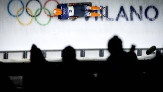 CORTINA D'AMPEZZO - Skeletonster Kimberley Bos tijdens de vierde heat van het skeleton in het Cortina Sliding Centre. IRIS VAN DEN BROEK / ANP