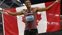 Overall decathlon winner, Canada's Pierce Lepage, celebrates with his national flag after the men's decathlon 1500m during the World Athletics Championships at the National Athletics Centre in Budapest on August 26, 2023. 
Jewel SAMAD / AFP