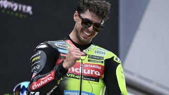 Team Pertamina Enduro VR46 Racing Team's Fabio Di Giannantonio celebrates on the podium after winning the 2026 Catalunya Moto GP Grand Prix at the Catalunya racetrack in Montmelo, near Barcelona, on May 17, 2026. 
JOSE JORDAN / AFP