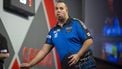 epa10367877 Jermaine Wattimena of the Netherlands reacts as he plays against Nathan Rafferty of Northern Ireland  (not pictured) during PDC World Darts Championships at Alexandra Palace in London, Britain, 15 December 2022.  EPA/TOLGA AKMEN