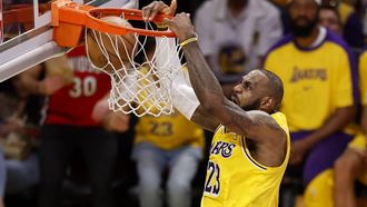 epa12008612 Los Angeles Lakers forward LeBron James dunks the ball during the third quarter of the NBA basketball game between the Golden State Warriors and the Los Angeles Lakers in Los Angeles, California, USA, 03 April 2025.  EPA/CAROLINE BREHMAN SHUTTERSTOCK OUT