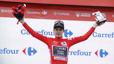 epa12371515 Danish cyclist Jonas Vingegaard of Team Visma in the overall leader red jersey after the 19th stage of La Vuelta a Espana cycling race that covers 161.9 km between Rueda and Guijuelo towns, Spain, 12 September 2025.  EPA/Javier Lizon