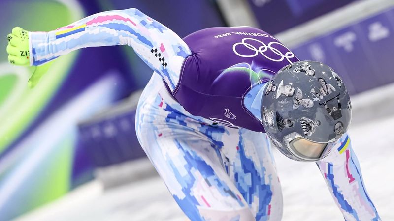 epa12726947 Vladyslav Heraskevych of Ukraine wears a helmet in memory of the Ukrainian athletes who died in the war during the Men's Skeleton training session at the Milano Cortina 2026 Winter Olympic Games, in Cortina d'Ampezzo, Italy, 11 February 2026.  EPA/ANDREA SOLERO