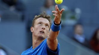 epa11314882 Jiri Lehecka of Czech Republic in action during his quarter-finals match against Daniil Medvedev of Russia at the Madrid Open tennis tournament in Madrid, Spain, 02 May 2024.  EPA/JUANJO MARTIN