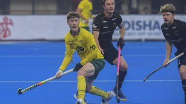 Australia's Matt Dawson (L) fights for the ball during the men's semi-final match between Australia and Germany at the FIH Odisha Field Hockey Men's World Cup 2023, in Bhubaneswar on January 27, 2023.  
Dibyangshu SARKAR / AFP