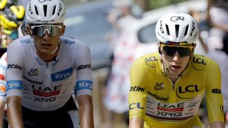 epa13107031 Yellow Jersey overall leader Slovenian cyclist Tadej Pogacar (R) and White Jersey best young rider Mexican cyclist Isaac del Toro (L) of UAE Team Emirates XRG in action during Stage 9 of the Tour de France, a 154.6 km route from Malemort to Ussel, France, 12 July 2026.  EPA/GUILLAUME HORCAJUELO
