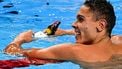 Romania's swimmer David Popovici celebrates winning the final of the men's 100m freestyle swimming event during the 2025 World Aquatics Championships in Singapore on July 31, 2025. 
MANAN VATSYAYANA / AFP