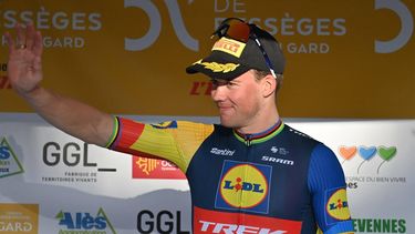 Overall winner, Lidl-Trek team's Danish rider Mads Pedersen celebrates on the podium after the fifth and last time-trial stage departing and finishing in Ales, during the 54th Etoile de Besseges-Tour du Gard cycling race, in Ales on February 4, 2024. 
Sylvain THOMAS / AFP