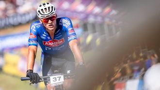 epa13186759 Mathieu van der Poel of The Netherlands crosses the finish line in second place during the Men's Cross Country Elite, XCO, WHOOP UCI Mountain Bike World Series in Les Gets, France, 23 August 2026.  EPA/MAXIME SCHMID