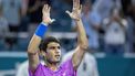 epa11246118 Carlos Alcaraz of Spain celebrates his victory against Lorenzo Musetti of Italy during their men's round of 16 tennis match at the 2024 Miami Open tennis tournament, in Miami, Florida, USA, 26 March 2024.  EPA/CRISTOBAL HERRERA-ULASHKEVICH