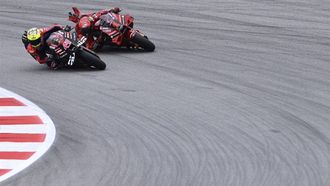 2023-09-02 15:13:00 Aprilia Spanish rider Aleix Espargaro (L) competes against Ducati Italian rider Francesco Bagnaia during the MotoGP sprint race of the Catalunya Moto Grand Prix at the Circuit de Catalunya on September 2, 2023 in Montmelo on the outskirts of Barcelona. Aleix Espargaro won the Catalunya MotoGP sprint race at Montmelo today. World champion Francesco Bagnaia took second to extend his lead in the riders' standings with Maverick Vinales completing the podium.
Josep LAGO / AFP