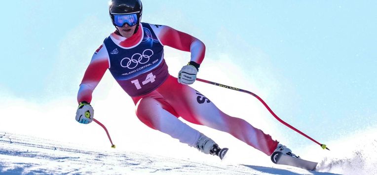 Switzerland's Franjo von Allmen competes in the downhill run of the men's team combined alpine skiing event during the Milano Cortina 2026 Winter Olympic Games at the Stelvio Ski Centre in Bormio (Valtellina) on February 9, 2026. 
Dimitar DILKOFF / AFP