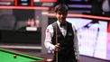 China's Zhao Xintong reacts having lost the first four frames of the final session, on day two of his World Championship Snooker final against Wales' Mark Williams at The Crucible in Sheffield, northern England on May 5, 2025.  
Oli SCARFF / AFP