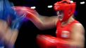 Netherlands' Chelsey Heijnen (in red) punches Brazil's Beatriz Iasmin Soares Ferreira in the women's 60kg quarter-final boxing match during the Paris 2024 Olympic Games at the North Paris Arena, in Villepinte on July 31, 2024. 
MOHD RASFAN / AFP