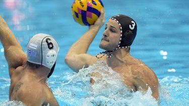 2023-07-29 18:45:38 epa10775518 Krisztian Manhercz of Hungary in action against Greece at the Men's Water Polo Gold Medal Match between Greece and Hungary during the World Aquatics Championships 2023 in Fukuoka, Japan, 29 July 2023.  EPA/FRANCK ROBICHON