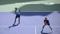 2023-10-11 22:02:44 Netherlands' Wesley Koolhof (R) and Britain’s Neal Skupski play a point against France’s Sadio Doumbia and Fabien Reboul during their men's doubles quarter-final match at the Shanghai Masters tennis tournament on October 12, 2023. 
WANG Zhao / AFP