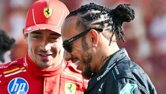 Mercedes' British driver Lewis Hamilton (R) and Ferrari's Monegasque driver Charles Leclerc arrive for a group photo ahead of the Abu Dhabi Formula One Grand Prix at the Yas Marina Circuit in Abu Dhabi on December 8, 2024. 
Andrej ISAKOVIC / AFP