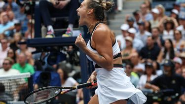 Belarus's Aryna Sabalenka reacts after defeating Switzerland's Rebeka Masarova during their women's singles first round tennis match on day one of the US Open tennis tournament at the USTA Billie Jean King National Tennis Center in New York City, on August 24, 2025. 
TIMOTHY A. CLARY / AFP