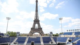 epa11437053 View of the Eiffel Tower from the Stade Tour Eiffel which will host Beach volley competitions of the Paris 2024 Olympic Games, in Paris, France, 25 June 2024. The Paris 2024 Olympic Games will take place from 26 July to 11 August 2024.  EPA/Teresa Suarez