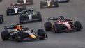 epa10995993 Dutch Formula One driver Max Verstappen of Red Bull Racing (L) and Monaco's Charles Leclerc of Scuderia Ferrari (R) lead the pack into turn 1 during the start of the Formula 1 Abu Dhabi Grand Prix in Abu Dhabi, United Arab Emirates, 26 November 2023.  EPA/ALI HAIDER