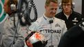 Mercedes'  German driver Michael Schumacher stands in the pits with his helmet during the first practice session at the Spa-Francorchamps circuit on August 31, 2012 in Spa ahead of the Belgium Formula One Grand Prix. AFP PHOTO / DIMITAR DILKOFF
DIMITAR DILKOFF / AFP