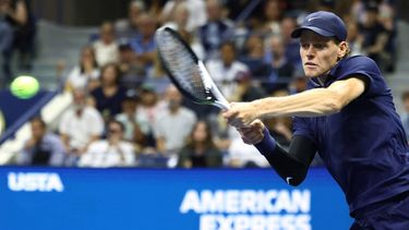 Italy’s Jannik Sinner plays a forehand return to Kazakhstan’s Alexander Bublik during their men's singles round of 16 tennis match on day nine of the US Open tennis tournament at the USTA Billie Jean King National Tennis Center in New York City, on September 1, 2025. 
CHARLY TRIBALLEAU / AFP