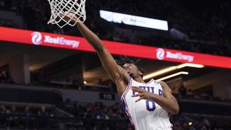 epa09785732 Philadelphia 76ers guard Tyrese Maxey goes up for a shot during second half of the NBA basketball game between the Philadelphia 76ers and the Minnesota Timberwolves at Target Center in Minneapolis, Minnesota, USA, 25 February 2022.  EPA/CRAIG LASSIG  SHUTTERSTOCK OUT