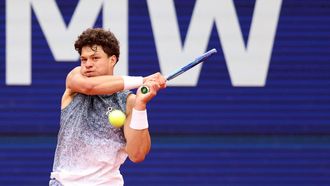 US' Ben Shelton returns the ball to Italy's Flavio Cobolli (not in picture) during the men's singles final match at the ATP Munich Open tennis tournament in Munich, southern Germany on April 19, 2026.  
Alexandra BEIER / AFP