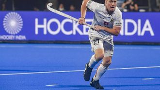 2023-01-27 17:46:40 Belgium's Tom Boon hits the ball during the men's semi-final match between Belgium and Netherlands at the FIH Odisha Field Hockey Men's World Cup 2023, in Bhubaneswar on January 27, 2023.  
Dibyangshu SARKAR / AFP