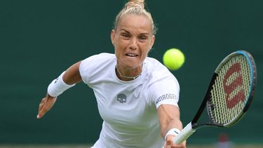 Netherlands' Arantxa Rus returns the ball to US Catherine Harrison during their women's singles tennis match on the second day of the 2022 Wimbledon Championships at The All England Tennis Club in Wimbledon, southwest London, on June 28, 2022.  
Adrian DENNIS / AFP