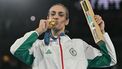 Gold medallist Algeria's Imane Khelif poses on the podium during the medal ceremony for the women's 66kg final boxing category during the Paris 2024 Olympic Games at the Roland-Garros Stadium, in Paris on August 9, 2024. 
MOHD RASFAN / AFP