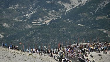 Riders cycle in the ascent of Mont Ventoux during the 16th stage of the 112th edition of the Tour de France cycling race, 171.5 km between Montpellier and Mont Ventoux, southern France, on July 22, 2025. 
Marco BERTORELLO / AFP