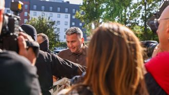 epa13194744 Head of Polish Olympic Commitee Radoslaw Piesiewicz (C-back) arrives at Prosecutor's Office in Katowice, Poland, 27 August 2026. Radoslaw Piesiewicz has been detained as part of the investigation into alleged large-scale fraud at Zondacrypto, Poland's largest cryptocurrency exchange, Justice Minister Waldemar Zurek announced on 27 August 2026. The Zondacrypto probe alleges illegal funding flows to Polish right-wing politicians and public institutions.  Piesiewicz faces scrutiny over a EUR 40,000 luxury watch and other expensive gifts allegedly accepted from the exchange's leadership for his help in 
