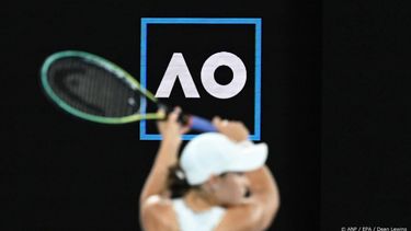 epa09711904 Ashleigh Barty of Australia plays in front of the Australian Open logo during her Women’s singles semifinal against Madison Keys of the USA  at the Australian Open Grand Slam tennis tournament at Melbourne Park, in Melbourne, Australia, 27 January 2022.  EPA/DEAN LEWINS AUSTRALIA AND NEW ZEALAND OUT