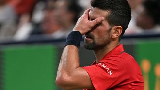 Serbia's Novak Djokovic reacts during his men's singles semi-final match against Monaco's Valentin Vacherot at the Shanghai Masters tennis tournament in Shanghai on October 11, 2025. 
Hector RETAMAL / AFP