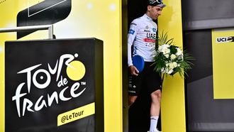 2023-07-12 17:54:20 UAE Team Emirates' Slovenian rider Tadej Pogacar celebrates on the podium with the best young rider's white jersey after the 11th stage of the 110th edition of the Tour de France cycling race, 180 km between Clermont-Ferrand and Moulins, in central France, on July 12, 2023. 
Marco BERTORELLO / AFP