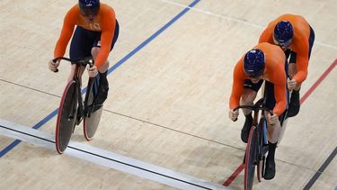 Netherlands' Roy van den Berg, Netherlands' Harrie Lavreysen and Netherlands' Jeffrey Hoogland compete in the men's track cycling team sprint qualifying round of the Paris 2024 Olympic Games at the Saint-Quentin-en-Yvelines National Velodrome in Montigny-le-Bretonneux, south-west of Paris, on August 5, 2024. 
Emmanuel DUNAND / AFP